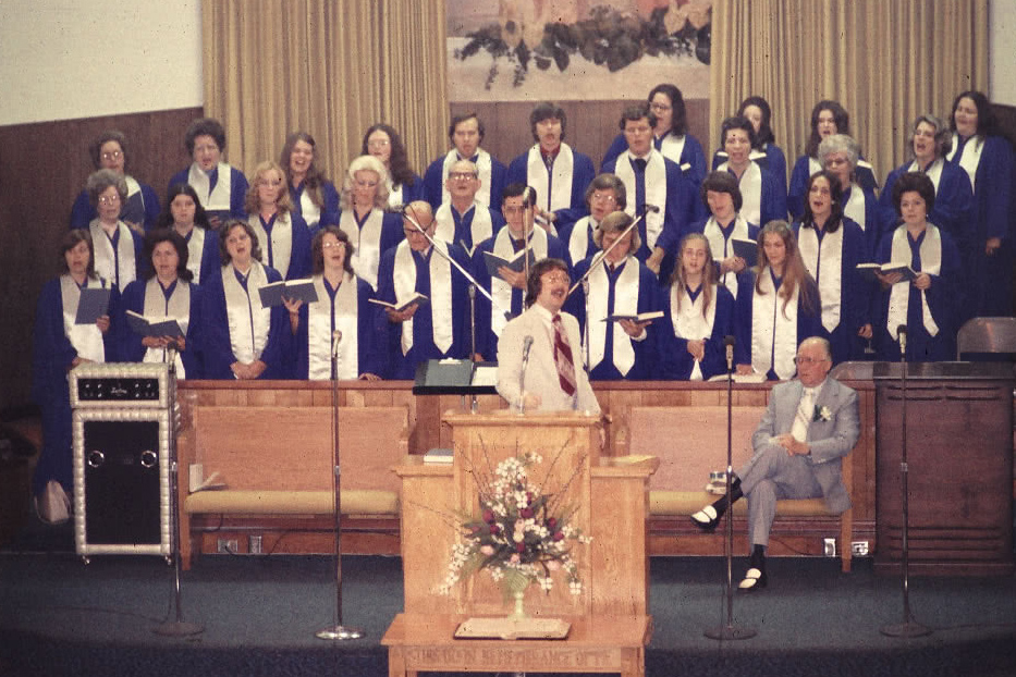 Choir singing in matching choir robes