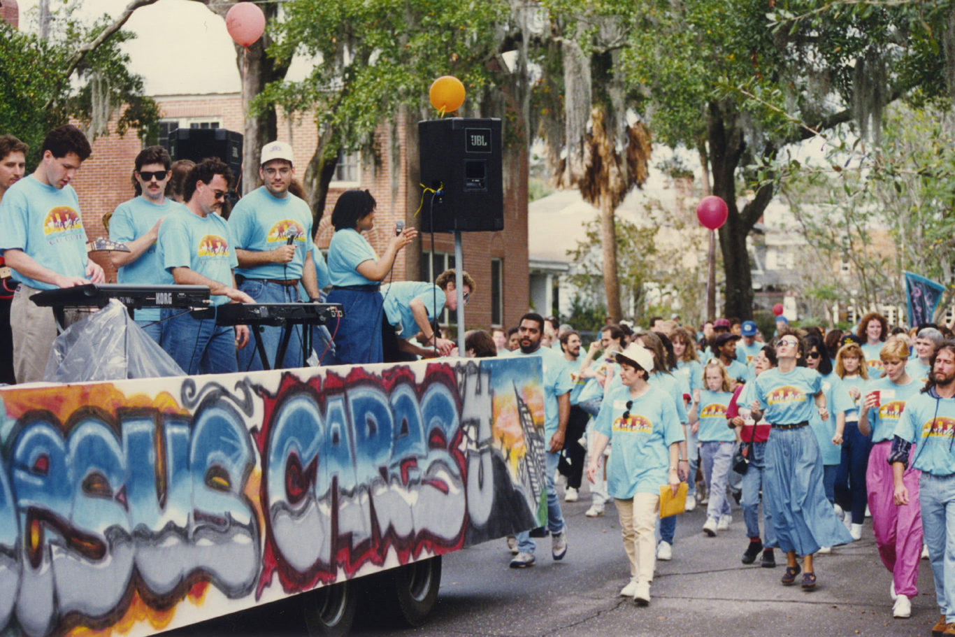 Church members walking behind a parade float
